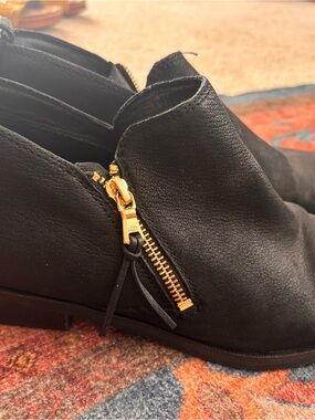 UGG Black Leather Ankle Boot with Gold Zipper Accent